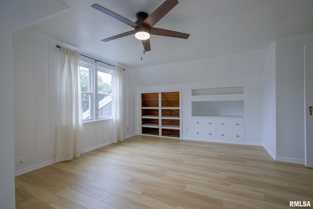2129 Fondulac Dr, East Peoria, IL 61611 - spare room featuring a ceiling fan, light wood-type flooring, and built in features