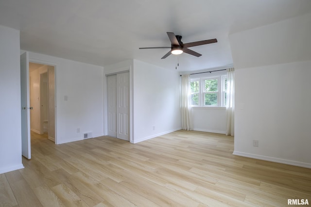 2129 Fondulac Dr, East Peoria, IL 61611 - empty room featuring a ceiling fan and light wood finished floors