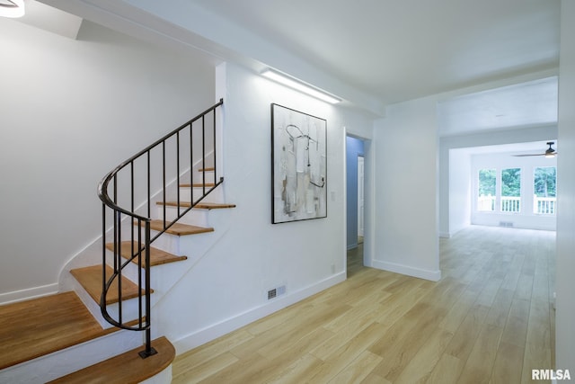 2129 Fondulac Dr, East Peoria, IL 61611 - stairway with wood finished floors and ceiling fan