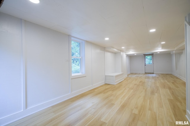 2129 Fondulac Dr, East Peoria, IL 61611 - below grade area with light wood-type flooring, recessed lighting, and plenty of natural light