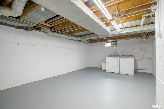 2129 Fondulac Dr, East Peoria, IL 61611 - basement with washing machine and clothes dryer and concrete block wall
