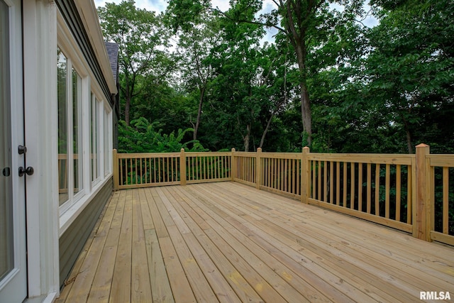2129 Fondulac Dr, East Peoria, IL 61611 - wooden deck featuring view of scattered trees