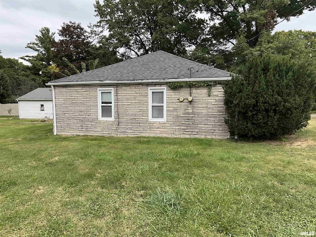 8701-8703 N Picture Ridge Rd, Peoria, IL 61615 - view of property exterior with stone siding, a yard, and a shingled roof