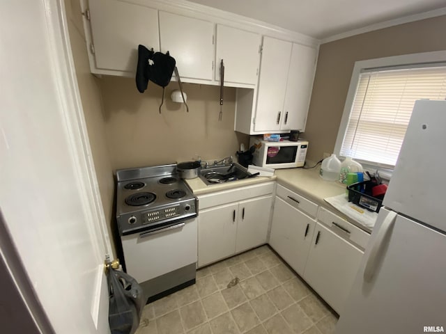 8701-8703 N Picture Ridge Rd, Peoria, IL 61615 - kitchen featuring white appliances, light countertops, white cabinetry, ornamental molding, and light tile patterned floors