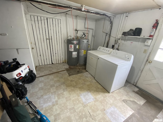 8701-8703 N Picture Ridge Rd, Peoria, IL 61615 - washroom featuring water heater, washer and clothes dryer, and light flooring