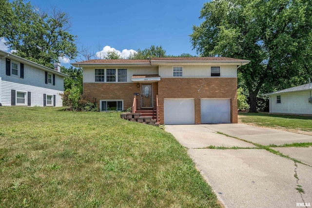 6822 N Kimberly Dr, Peoria, IL 61614 - bi-level home featuring brick siding, driveway, a front lawn, and an attached garage