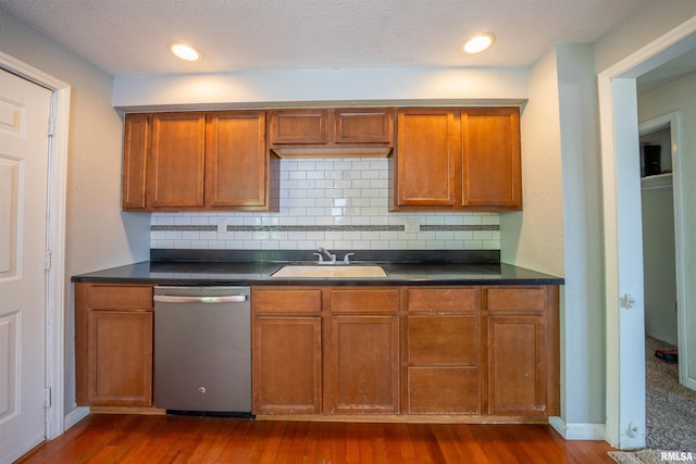 6822 N Kimberly Dr, Peoria, IL 61614 - kitchen featuring dishwasher, dark countertops, decorative backsplash, brown cabinets, and dark wood-type flooring