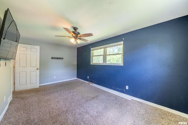 6822 N Kimberly Dr, Peoria, IL 61614 - carpeted spare room with a ceiling fan and baseboards