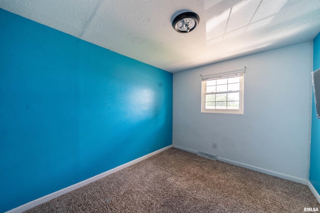6822 N Kimberly Dr, Peoria, IL 61614 - empty room featuring a textured ceiling and carpet floors