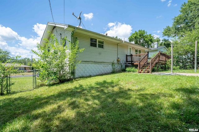 6822 N Kimberly Dr, Peoria, IL 61614 - rear view of house with a deck, stairs, and a gate