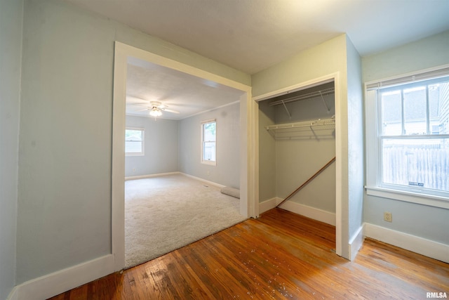 1025 E Maywood Ave, Peoria, IL 61603 - unfurnished bedroom featuring wood-type flooring and a closet