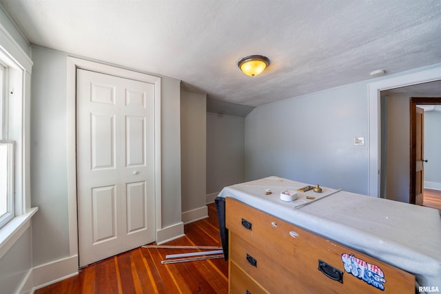 1025 E Maywood Ave, Peoria, IL 61603 - bedroom with dark wood-style floors and baseboards