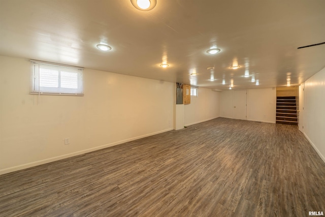 1025 E Maywood Ave, Peoria, IL 61603 - below grade area with dark wood-type flooring and stairs