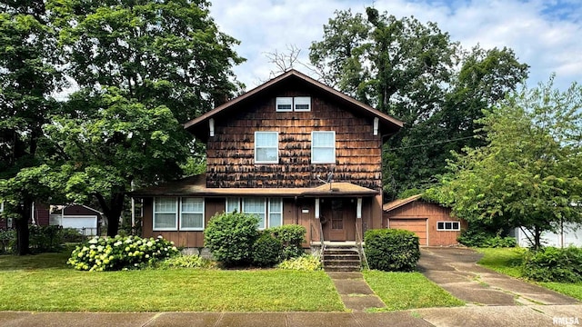 1113 N Summit Blvd, Peoria, IL 61606 - view of front of property featuring a front yard and an outdoor structure