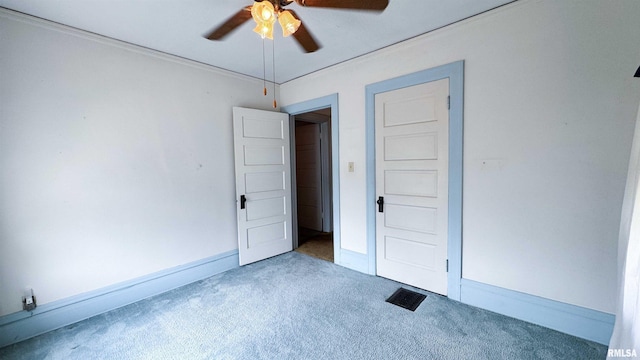 1113 N Summit Blvd, Peoria, IL 61606 - unfurnished room featuring carpet flooring, ceiling fan, and crown molding
