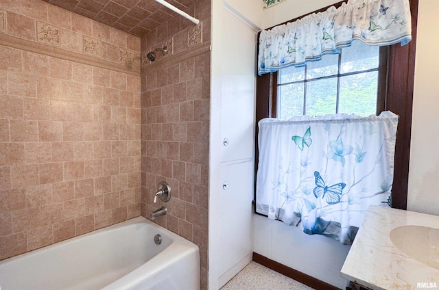 1113 N Summit Blvd, Peoria, IL 61606 - full bathroom featuring bathtub / shower combination, vanity, and speckled floor
