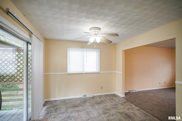 2705 W Millbrook Ct, Peoria, IL 61615 - unfurnished room featuring a ceiling fan and a textured ceiling