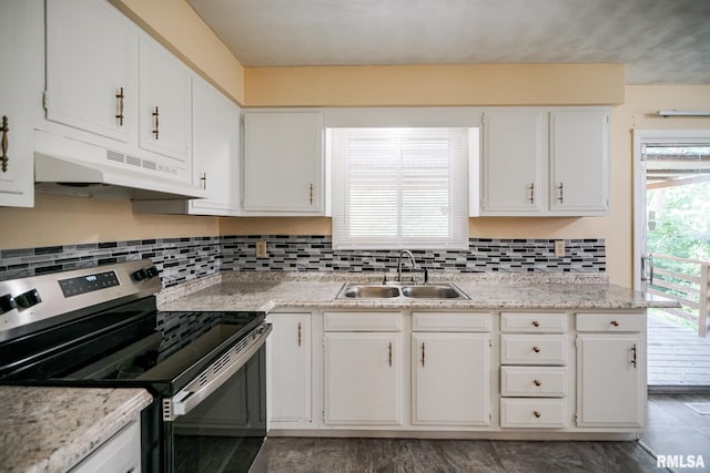 2705 W Millbrook Ct, Peoria, IL 61615 - kitchen with stainless steel range with electric stovetop, under cabinet range hood, white cabinets, and decorative backsplash