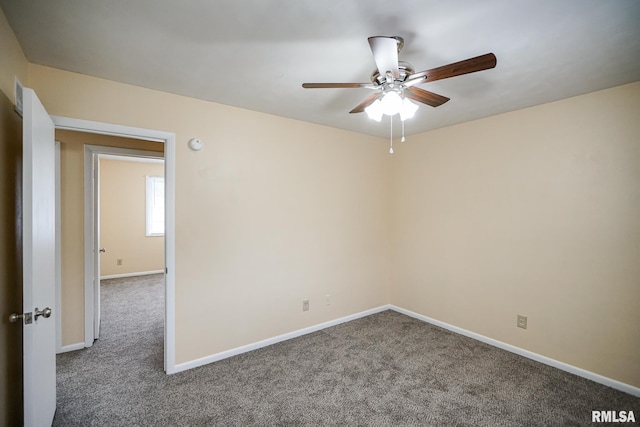 2705 W Millbrook Ct, Peoria, IL 61615 - unfurnished room featuring carpet, ceiling fan, and a smoke detector