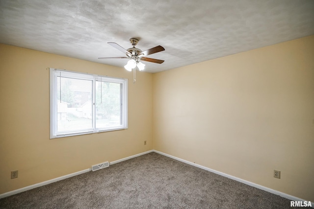 2705 W Millbrook Ct, Peoria, IL 61615 - carpeted empty room featuring ceiling fan and baseboards