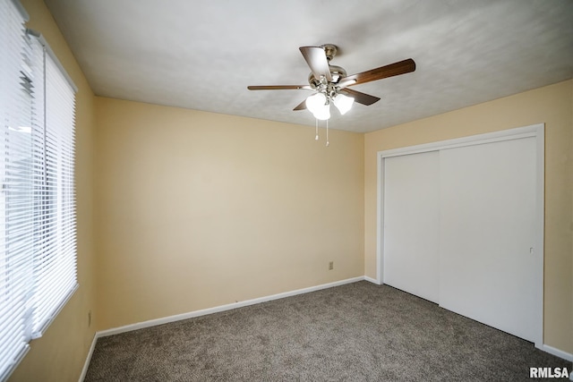 2705 W Millbrook Ct, Peoria, IL 61615 - unfurnished bedroom with carpet flooring, a closet, and ceiling fan