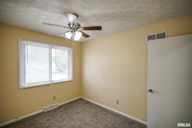 2705 W Millbrook Ct, Peoria, IL 61615 - empty room featuring a ceiling fan and carpet