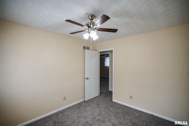 2705 W Millbrook Ct, Peoria, IL 61615 - carpeted spare room featuring a ceiling fan and baseboards