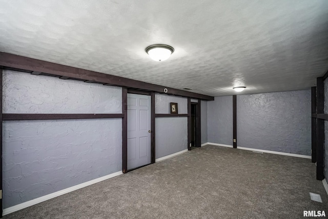 2705 W Millbrook Ct, Peoria, IL 61615 - finished basement with a textured wall, a textured ceiling, and carpet flooring