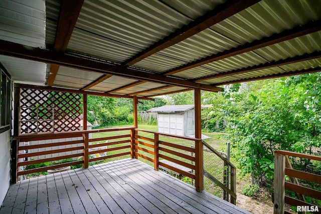 2705 W Millbrook Ct, Peoria, IL 61615 - wooden terrace featuring a storage unit
