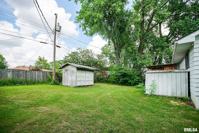 2705 W Millbrook Ct, Peoria, IL 61615 - fenced backyard with a storage shed