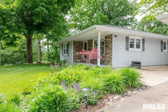 1701 Woodland Knolls Rd, Metamora, IL 61548 - view of front of house featuring a front yard, a porch, and stone siding