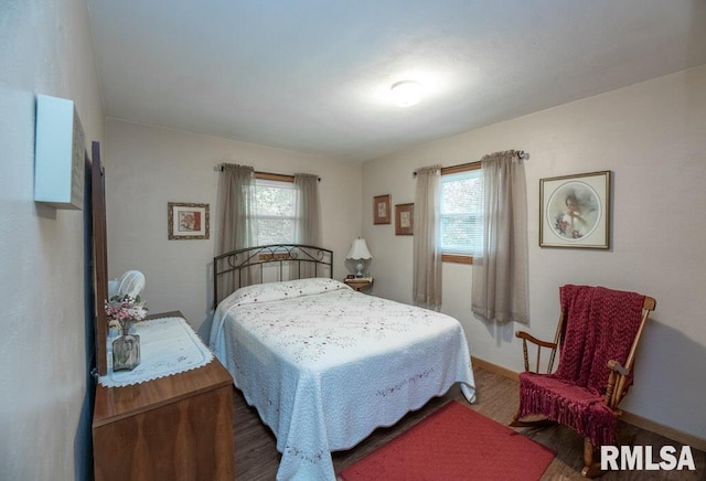 1701 Woodland Knolls Rd, Metamora, IL 61548 - bedroom featuring wood finished floors and multiple windows