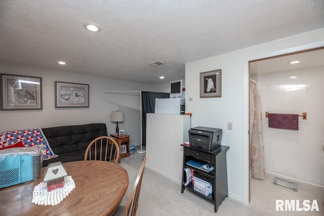 1701 Woodland Knolls Rd, Metamora, IL 61548 - dining room featuring light carpet, recessed lighting, and a textured ceiling