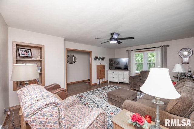 1701 Woodland Knolls Rd, Metamora, IL 61548 - living room featuring a ceiling fan and wood finished floors