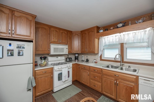 1701 Woodland Knolls Rd, Metamora, IL 61548 - kitchen featuring white appliances, dark wood finished floors, light countertops, and brown cabinets