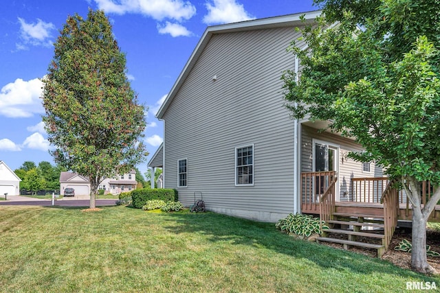 1129 Stonelake Ct, Metamora, IL 61548 - view of home's exterior featuring a wooden deck and a yard