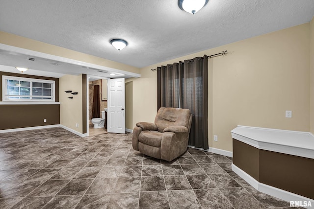 1129 Stonelake Ct, Metamora, IL 61548 - sitting room with a textured ceiling