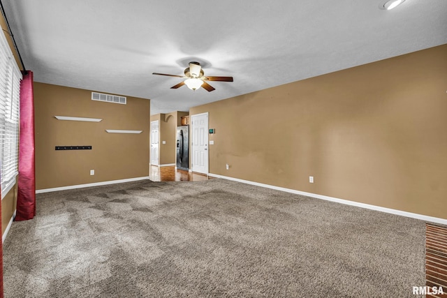 1129 Stonelake Ct, Metamora, IL 61548 - empty room featuring a ceiling fan and carpet floors