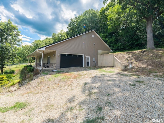 797 State Route 29th Hwy, Sparland, IL 61565 - view of side of home with a garage, driveway, and covered porch