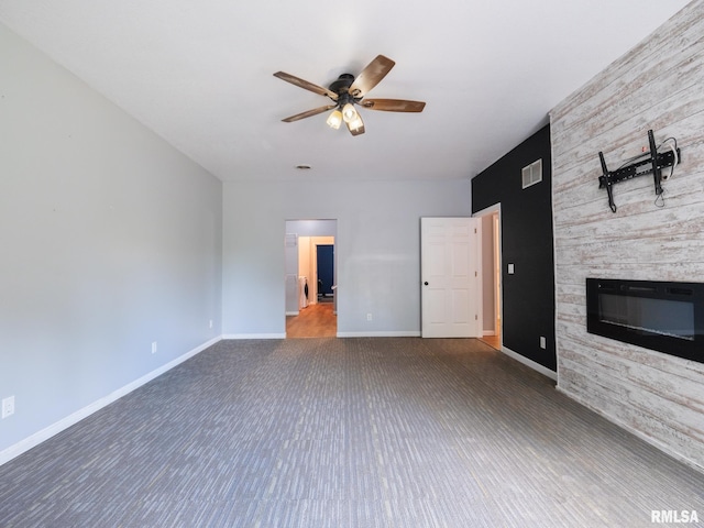 797 State Route 29th Hwy, Sparland, IL 61565 - unfurnished living room featuring ceiling fan, a fireplace, and wood finished floors
