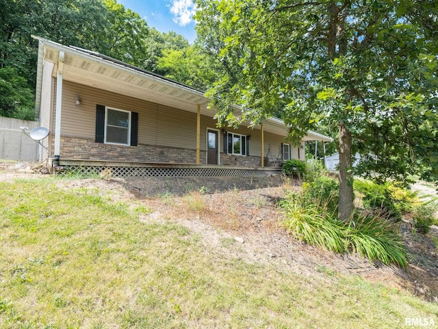 797 State Route 29th Hwy, Sparland, IL 61565 - view of front of property with a porch, stone siding, and a front lawn