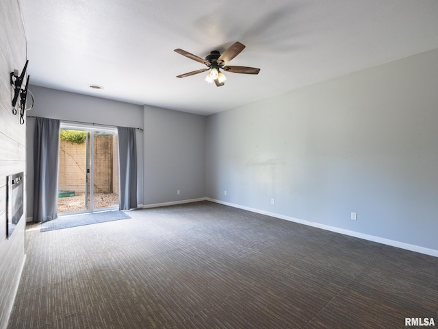 797 State Route 29th Hwy, Sparland, IL 61565 - spare room featuring dark colored carpet and ceiling fan