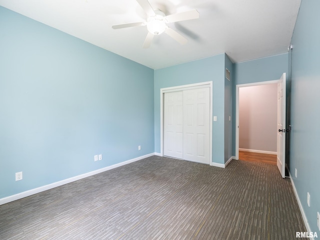797 State Route 29th Hwy, Sparland, IL 61565 - unfurnished bedroom featuring a closet, ceiling fan, and dark colored carpet