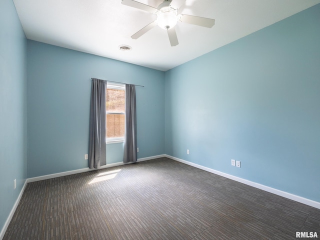 797 State Route 29th Hwy, Sparland, IL 61565 - spare room with dark carpet and ceiling fan
