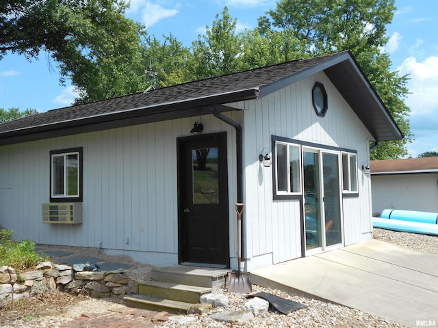 140 Palemino Ln, Avon, IL 61415 - back of property featuring roof with shingles and cooling unit