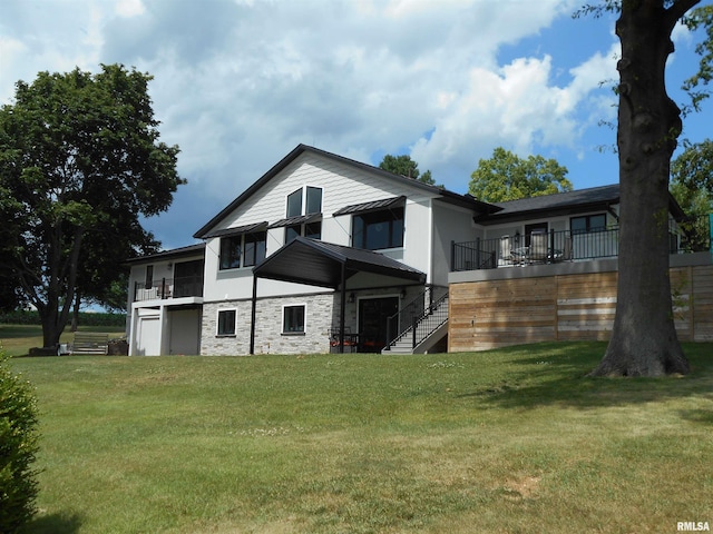 140 Palemino Ln, Avon, IL 61415 - rear view of property featuring stairway, stone siding, a garage, a yard, and a balcony
