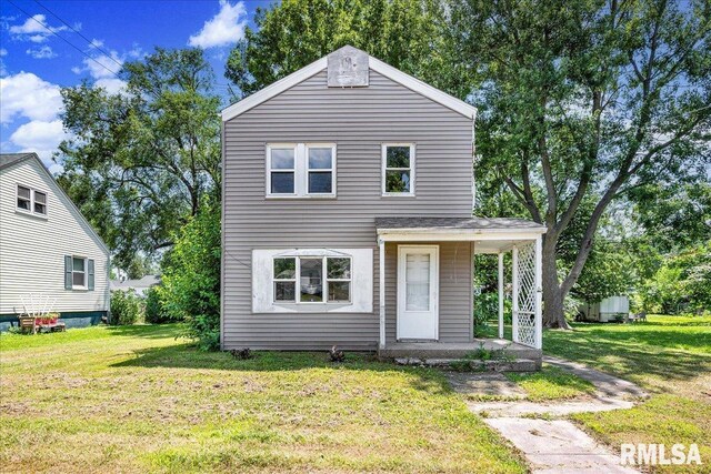 310 W Martin St, Abingdon, IL 61410 - view of front facade with a front lawn and covered porch