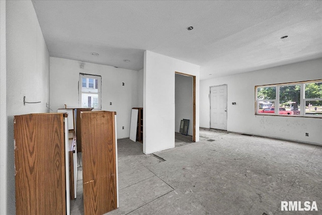 310 W Martin St, Abingdon, IL 61410 - spare room featuring plenty of natural light and a textured ceiling
