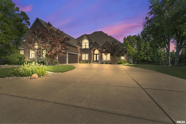 2815 W Windpointe Dr, Peoria, IL 61614 - view of front facade featuring concrete driveway and a garage