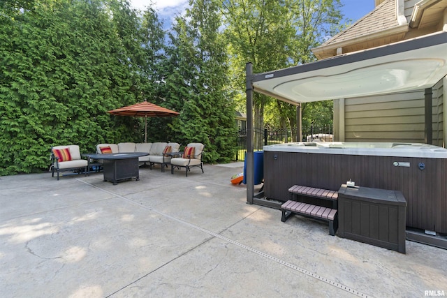 2815 W Windpointe Dr, Peoria, IL 61614 - view of patio / terrace featuring a hot tub and an outdoor living space with a fire pit